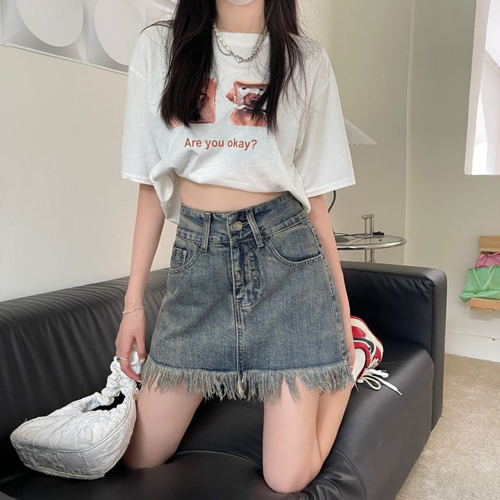 Kvinder's denim shorts med flagrende kant og høj talje