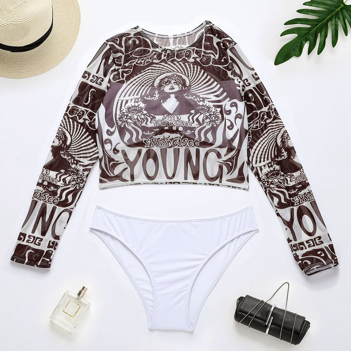 Dame Sporty Crop-Top med lange ærmer og elegant print Skovae