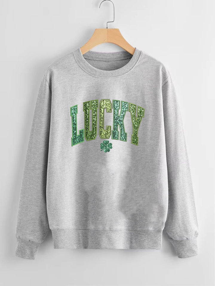 Dame casual sweatshirt med glitrende skrift og kløver motiv Stilla