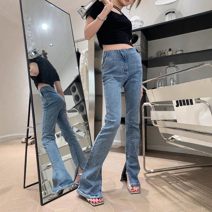 Dame Glitrende Bootcut-jeans med slids og strækanteil Skovae