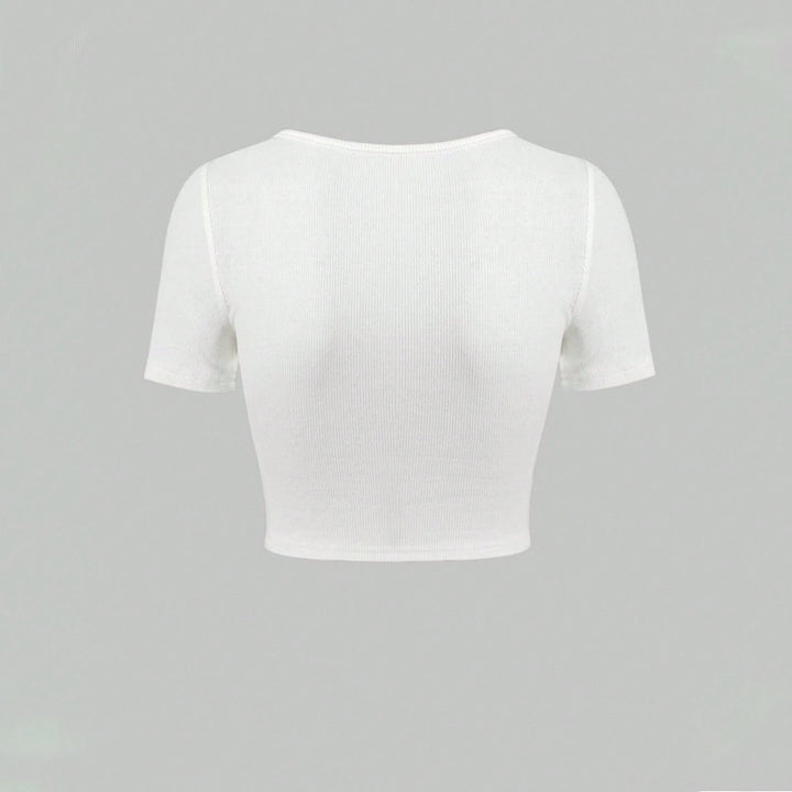 Kvinders crop top med v-hals og dekorativ ringdetalje Stilla