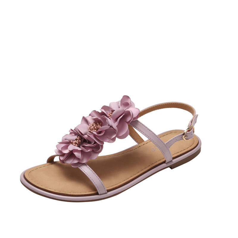 Dame sandaler med dekorativt blomsterdesign og fleksibel sål Stilla