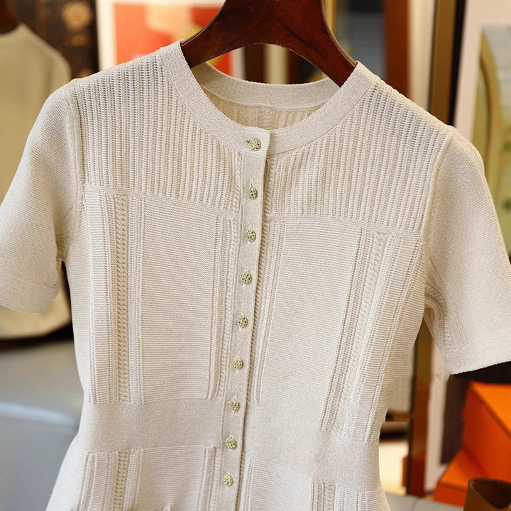 Dame strikbluse med struktureret design og praktiske lommer Stilla