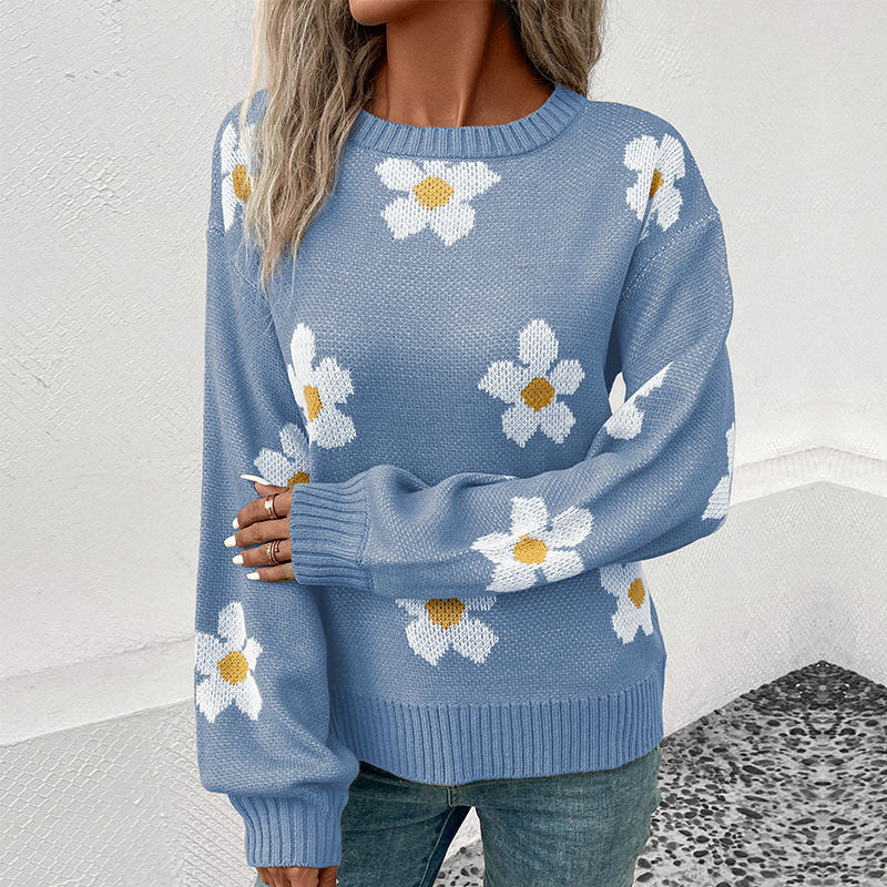 Dame strikbluse med florale accenter og løs pasform Stilla