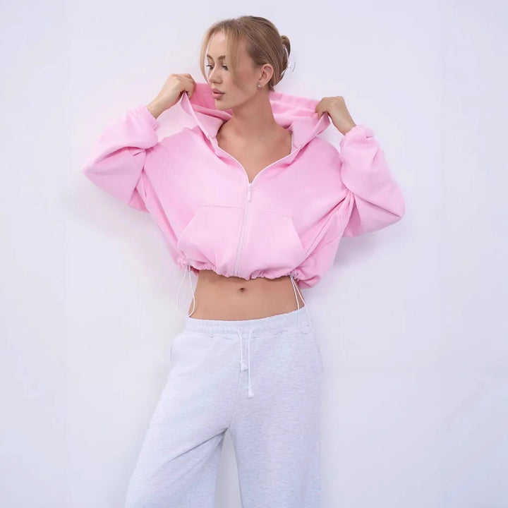 Dame cropped hoodie jakke med voluminøse ærmer og praktiske lommer Skovae