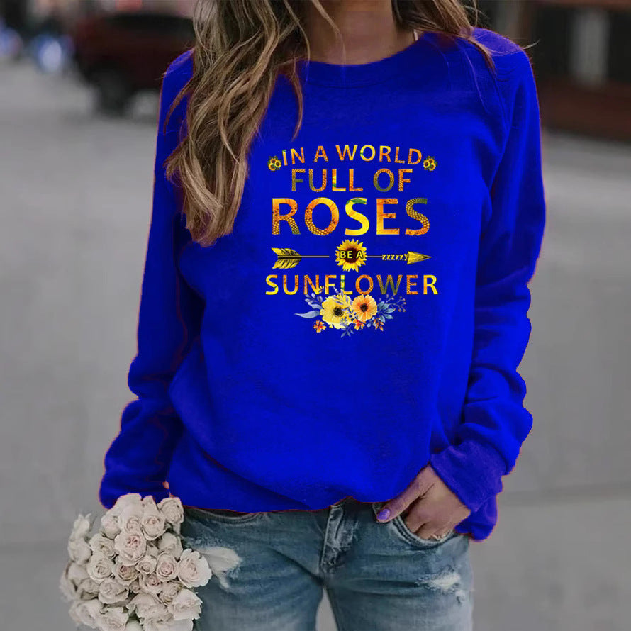 Dame sweatshirt med inspirerende design og blomsterdekoration Stilla