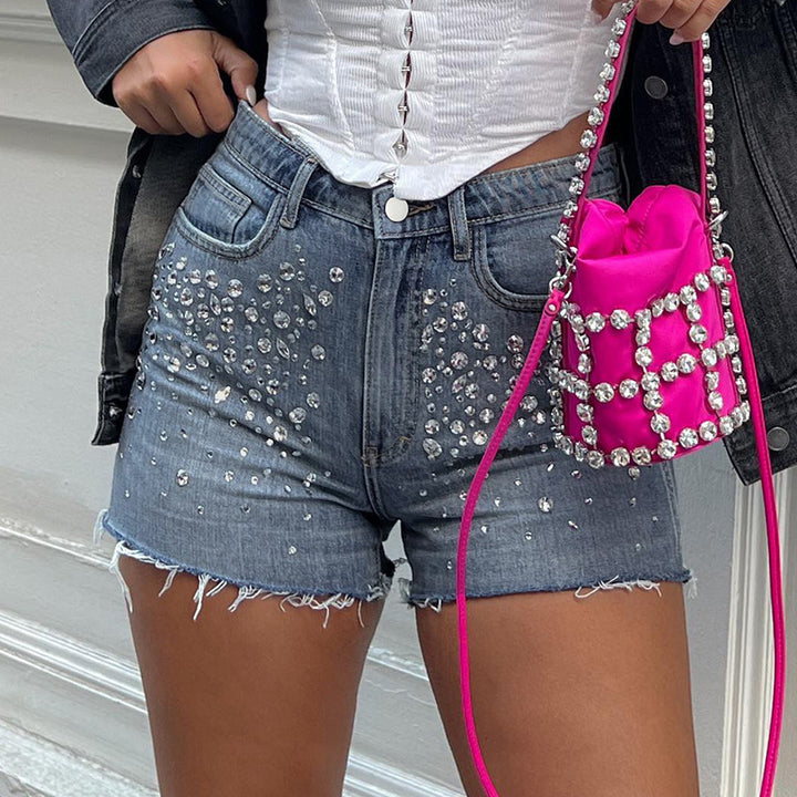 Dame jeans shorts med glitrende applikationer og frynset kant Skovae