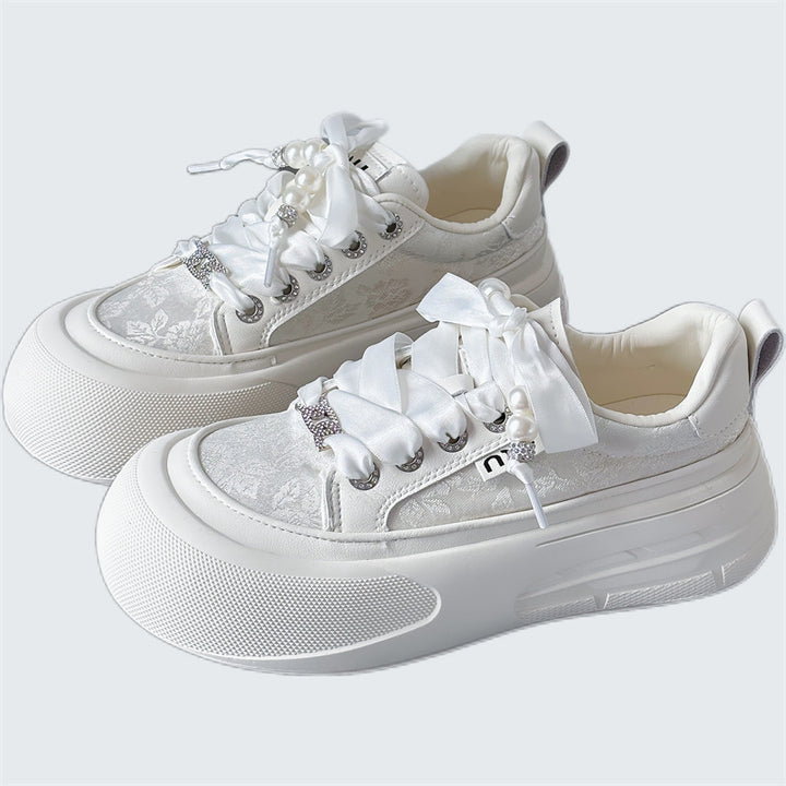 Dame mode-sneakers med dekorative satinbånd og slidstærkt designer-overmateriale Stilla