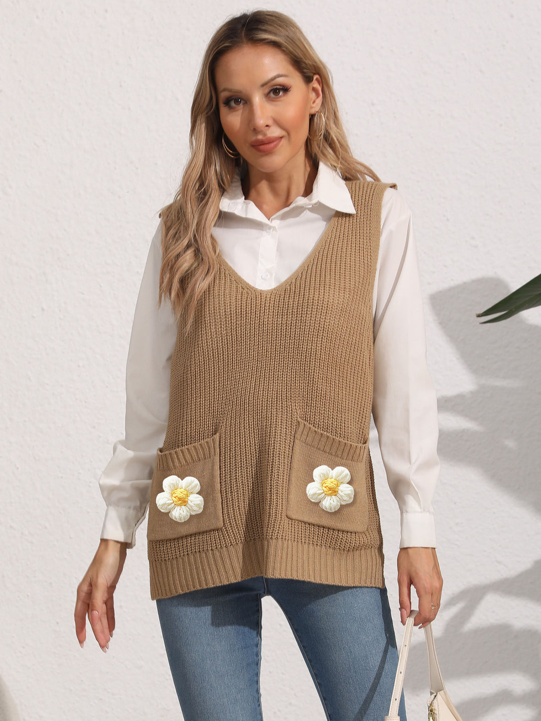 Dame strikvest med lommer og florale applikationer Stilla
