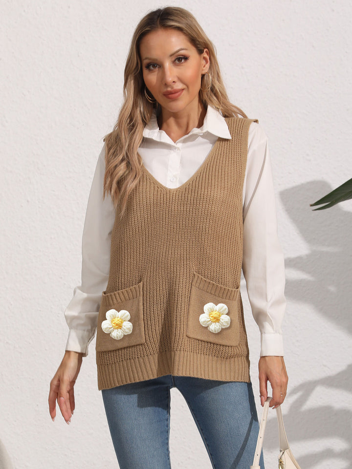 Dame strikvest med lommer og florale applikationer Stilla