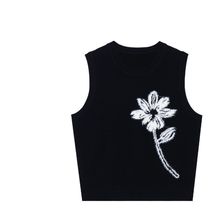Dame strikvest med blomstermotiv og elegant krave Stilla