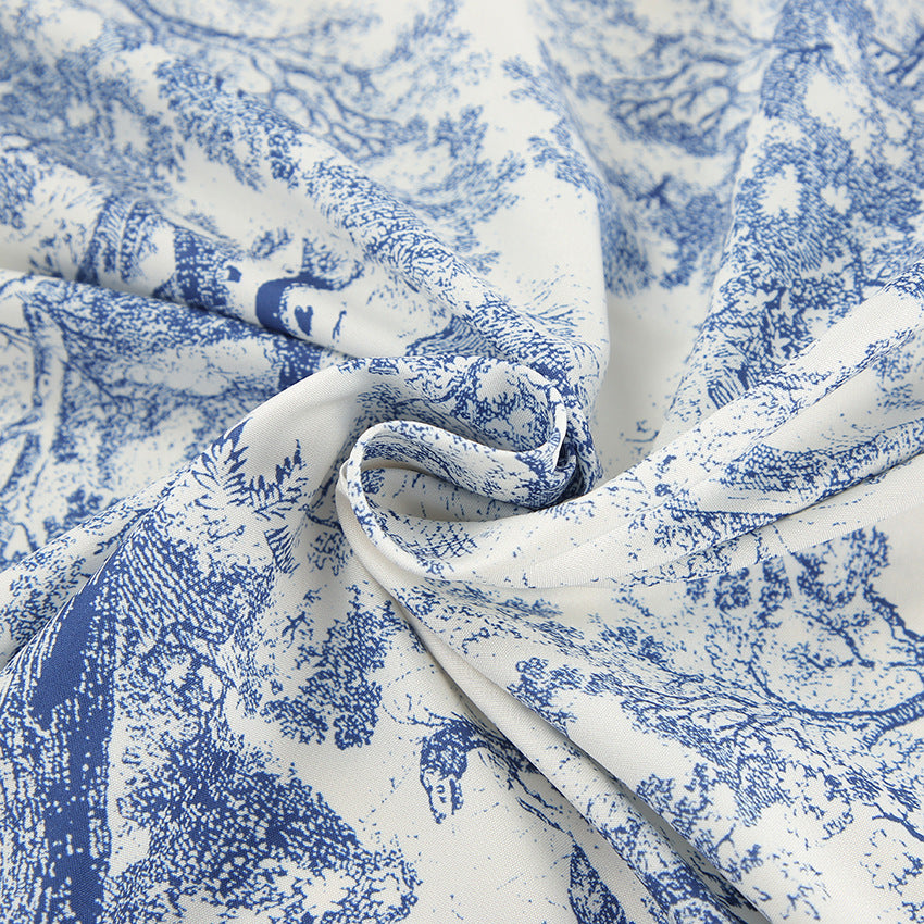 Damebluse med voluminøse ærmer og blomsterdesign Stilla