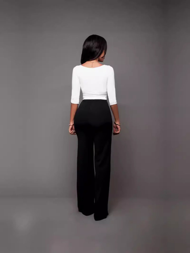 Dame Flared High-Waist-bukser med dekorative knapper Stilla