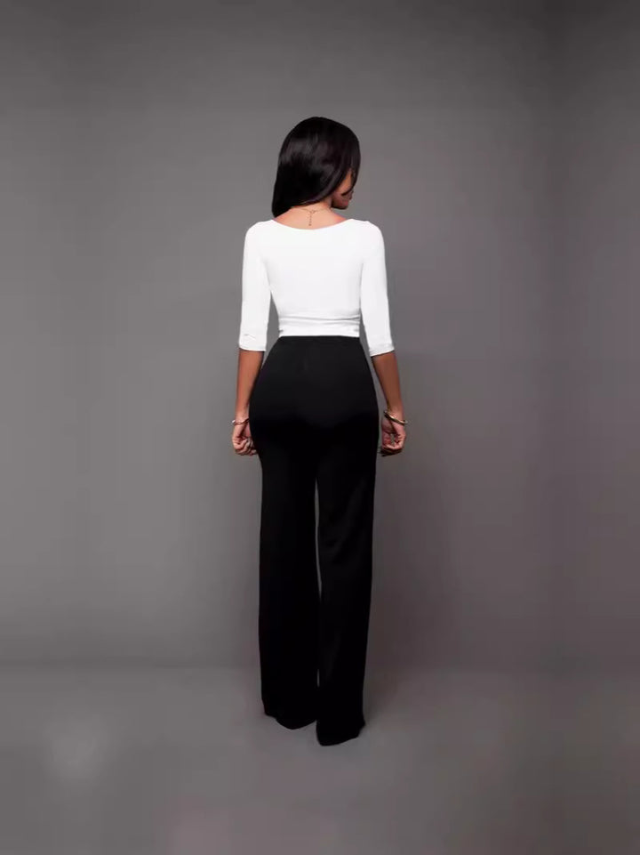 Dame Flared High-Waist-bukser med dekorative knapper Stilla