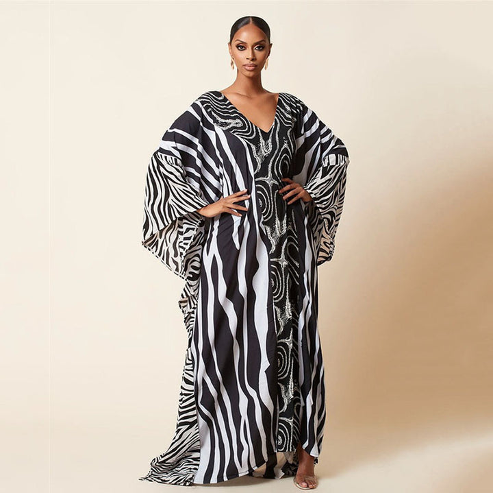 Dame elegant Kaftan med kunstnerisk zebramønster og glitrende accenter Stilla