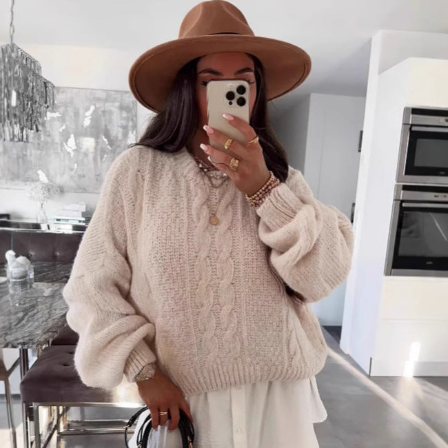 Kvinders chunky strik sweater med voluminøse ærmer og kabelmønster Stilla