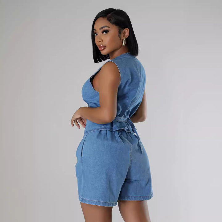 Dame Denim- jumpsuit med tætsiddende pasform og knapdesign Stilla