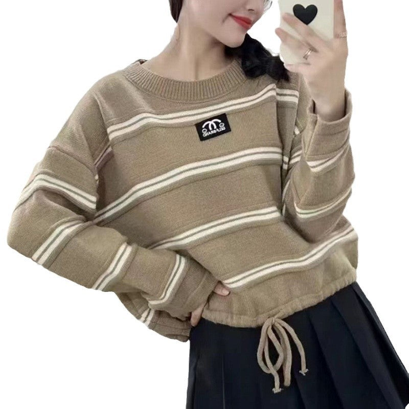 Kvinders stribede sweater med stilfuld snoretræk og afslappet oversized pasform
