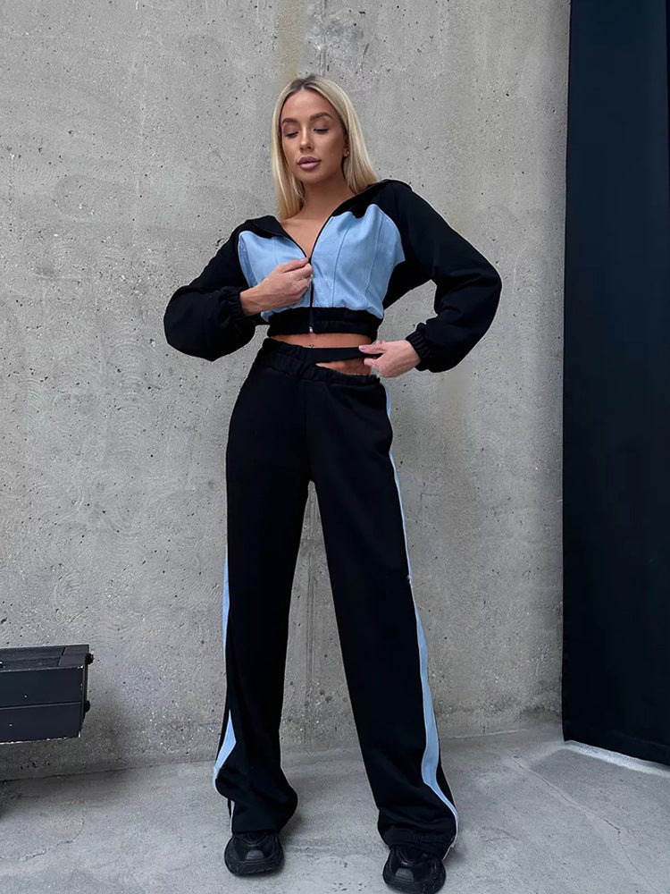 Kvinders sporty loungewear sæt lavet af blødt materiale med kængurulomme Skovae