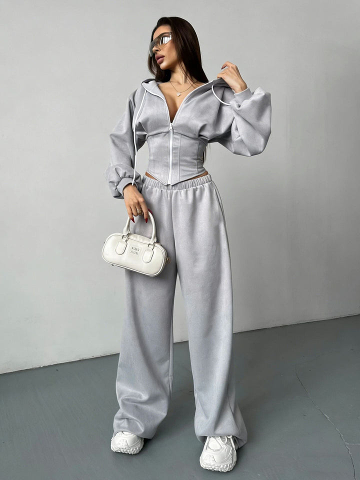 Kvinder sporty sæt af cropped hoodie jakke og brede joggingbukser med elastisk talje Skovae