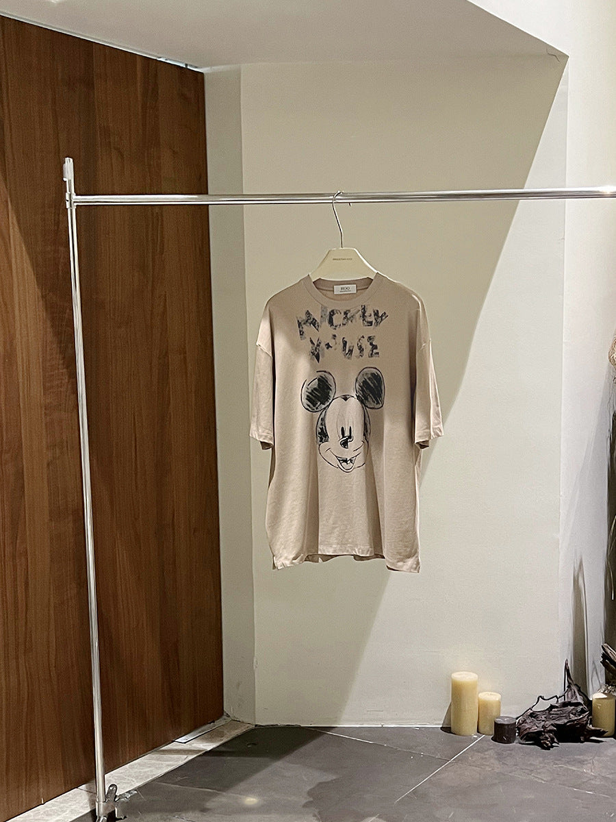 Dame T-shirt med unikt Mickey Mouse tryk og afslappet snit Stilla