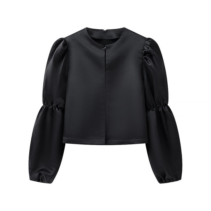 Kvindernes elegant skræddersyede blouse med voluminøse ærmer Stilla