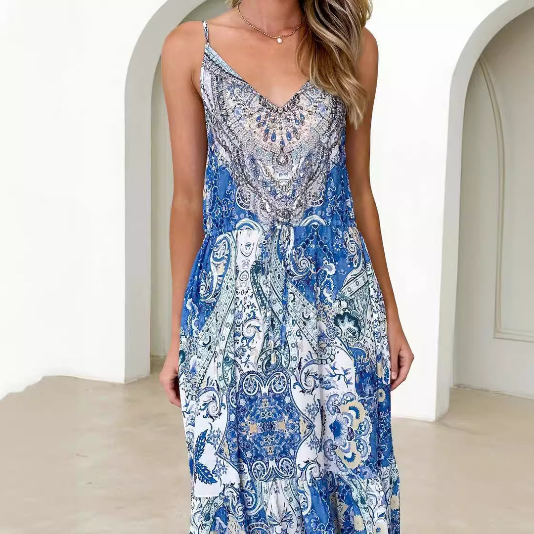 Dame maxi kjole i elegant etnisk design med lommer og en blød V-hals
