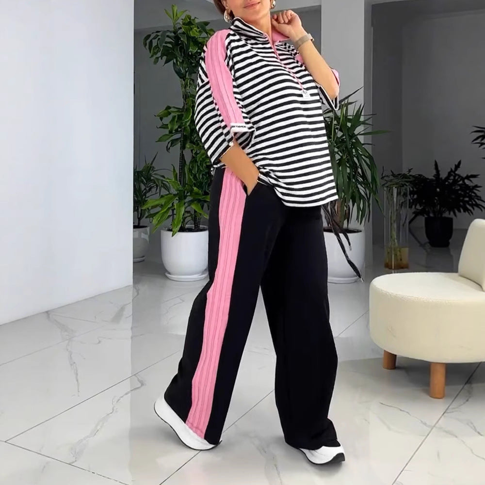 Dame overdimensioneret polo T-shirt med stribet design og modige accenter Stilla