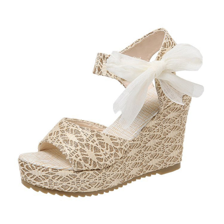Dame nan romantisk kilehælsandalette med spidse detaljer og organza-sløjfe Skovae