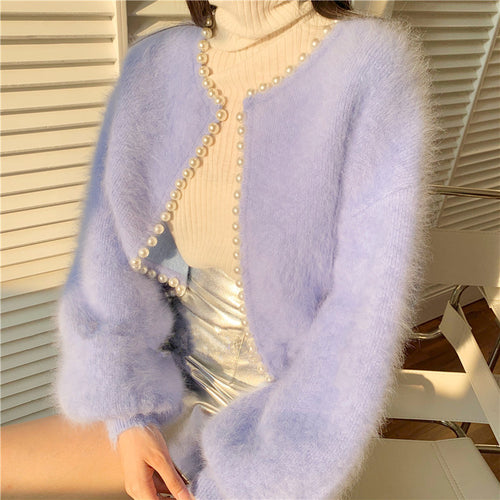 Kvinders fluffy cardigan med perlekant og trendy snit Stilla