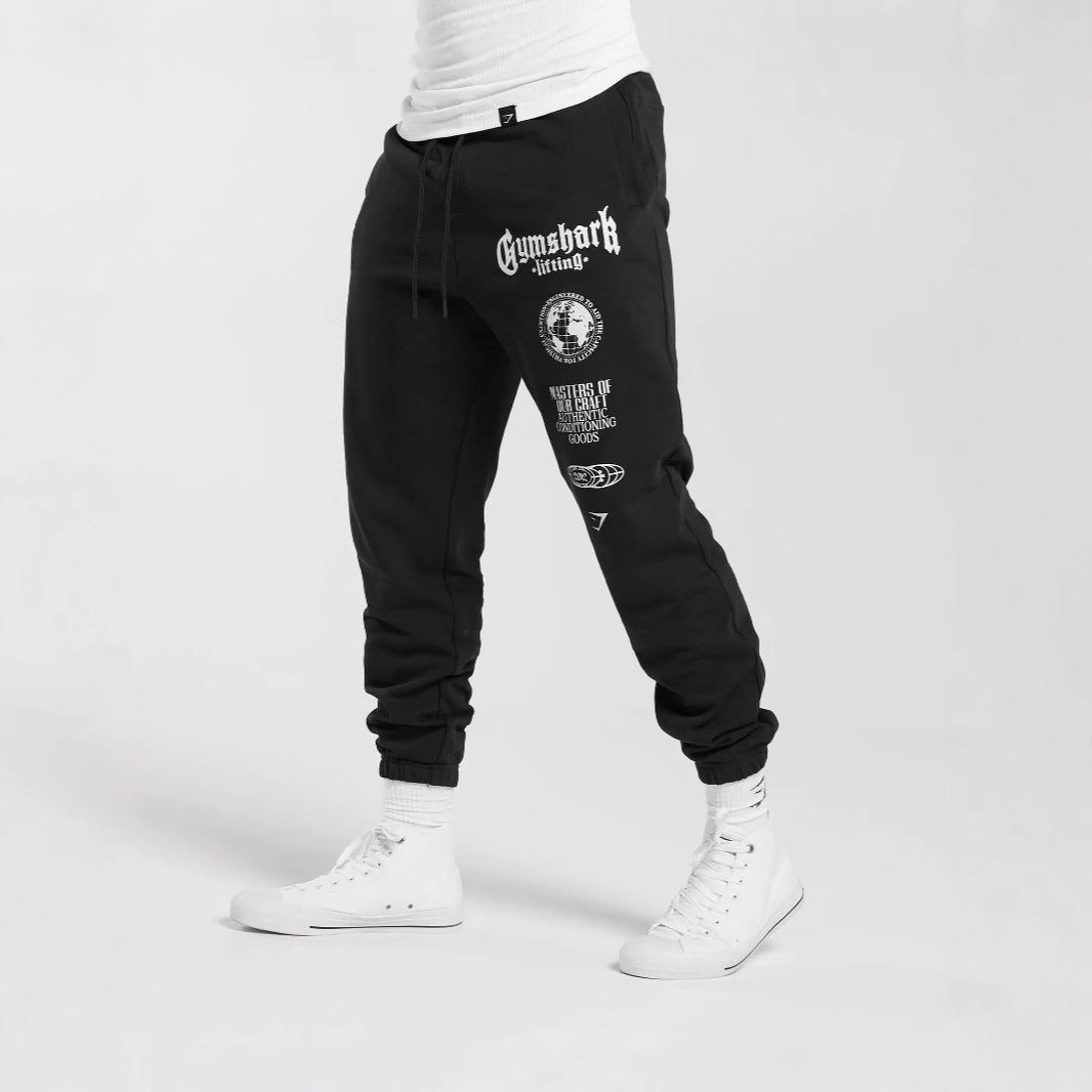 Herre nan konisk skåret bomuldsfleece-sweatpants med elastisk snoretræk ribbede benafslutninger og stort logotryk Skovae