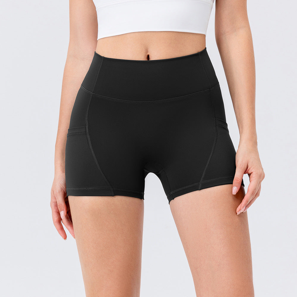 Dame Sporty Høj Talje Shorts med sidelommer og fleksibel pasform Stilla