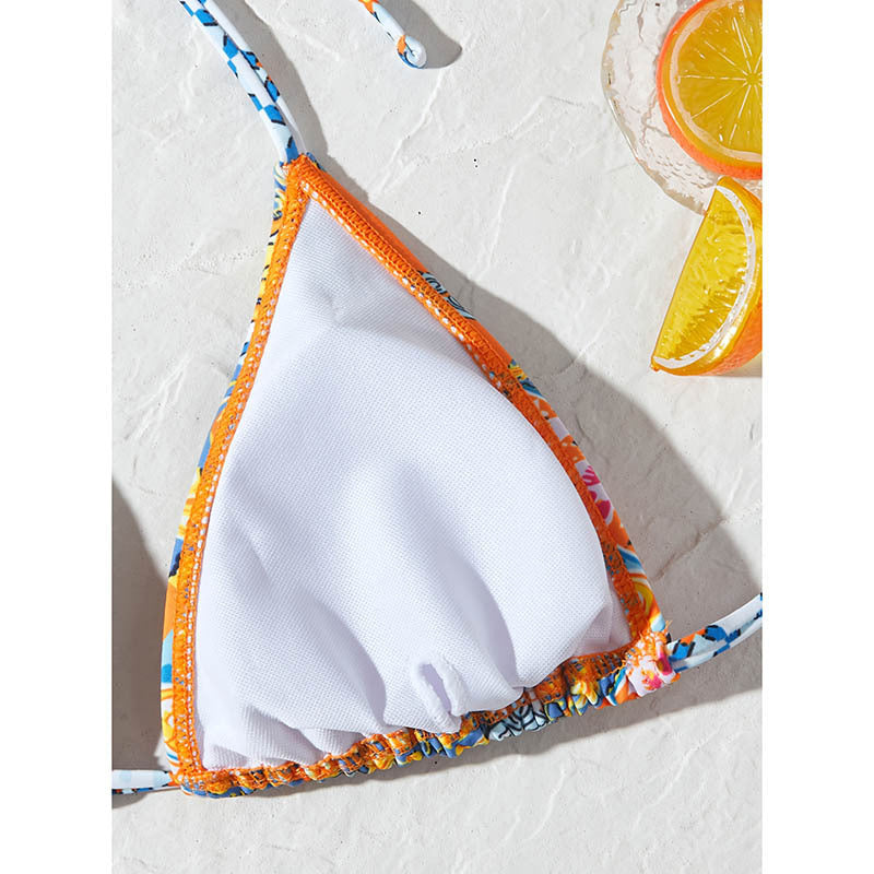 Dame triangel-bikini med legende blomsterdesign og elegante bånd