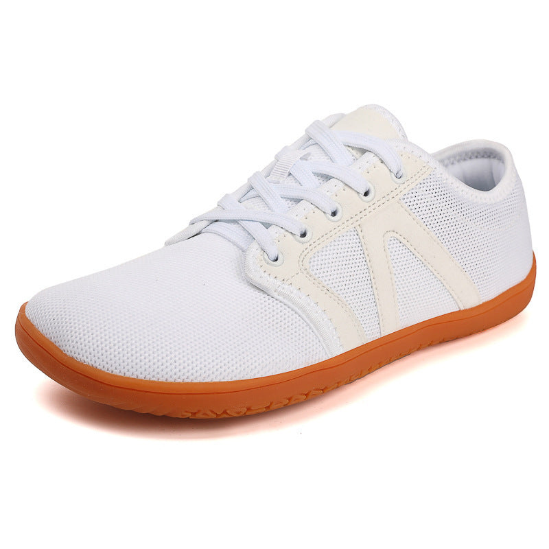 Unisex nan minimalistiske City sneakers med fint masket tekstiloverdel, polstret indgang og fleksibel gummisål Skovae