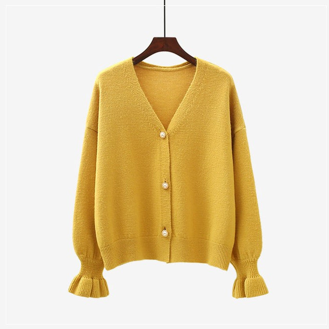 Kvinders cardigan med elegante perleknapper Stilla