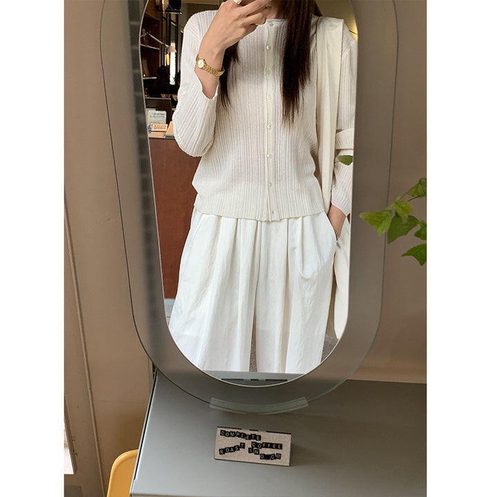 Dame fin strik cardigan med klassisk knaplukning og elegant ribstruktur Stilla
