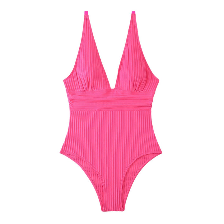 Dame onepiece badedragt med sporty ribbemønster og dyb V-udskæring Stilla