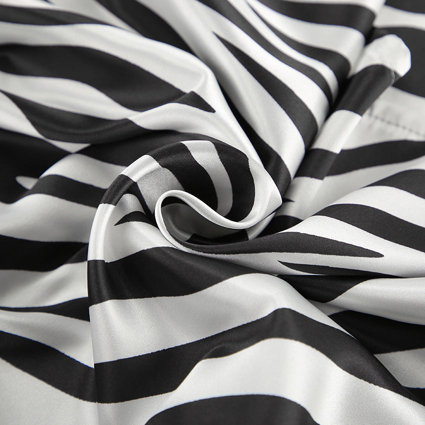 Damer satin pyjamasæt med zebra-print og løs pasform Stilla