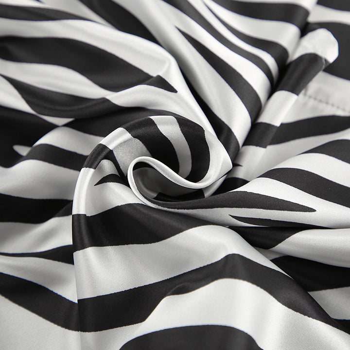 Damer satin pyjamasæt med zebra-print og løs pasform Stilla