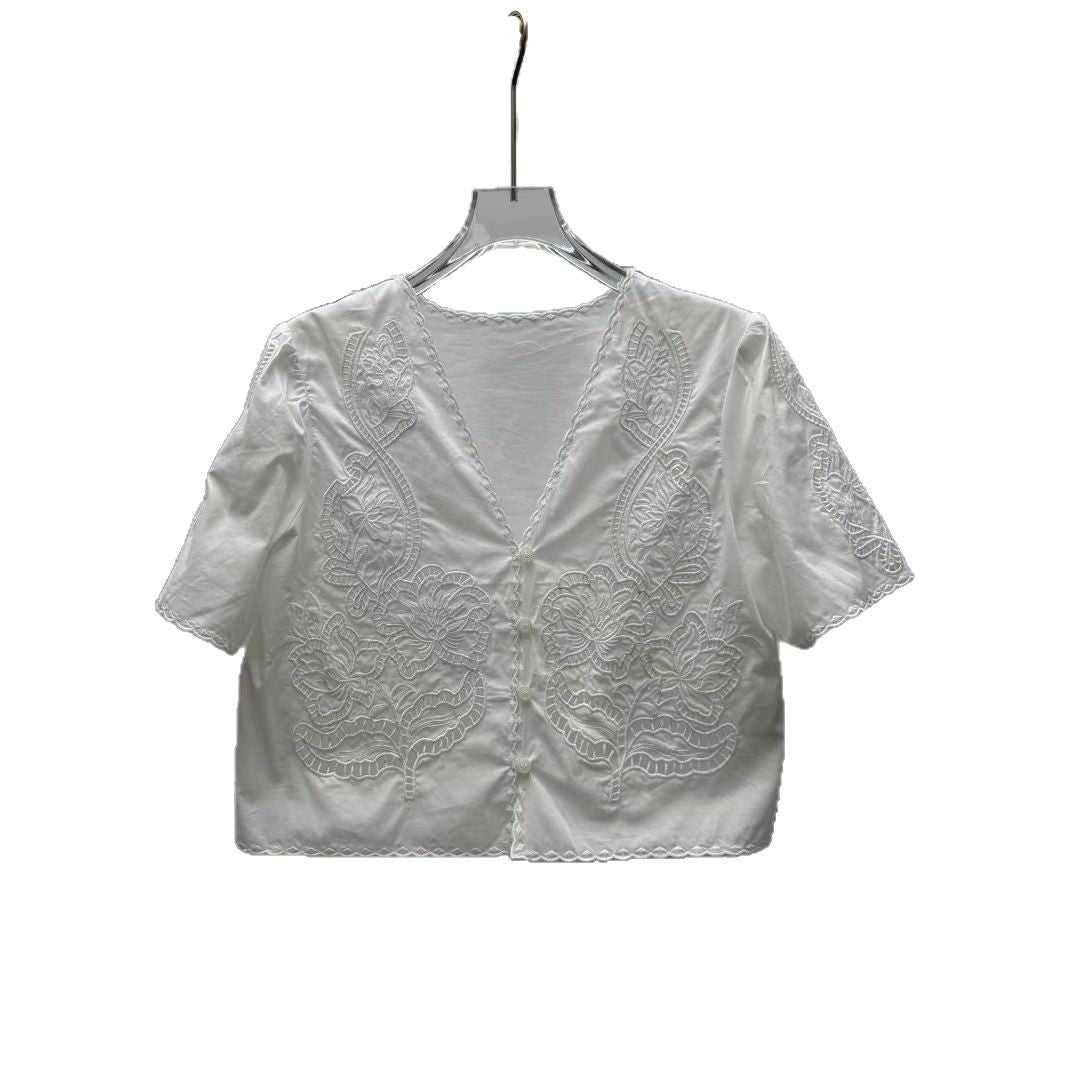 Damebluse med filigran broderedesign og romantisk V-udskæring Stilla