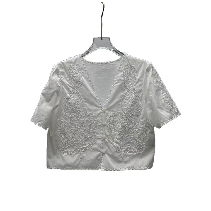 Damebluse med filigran broderedesign og romantisk V-udskæring Stilla