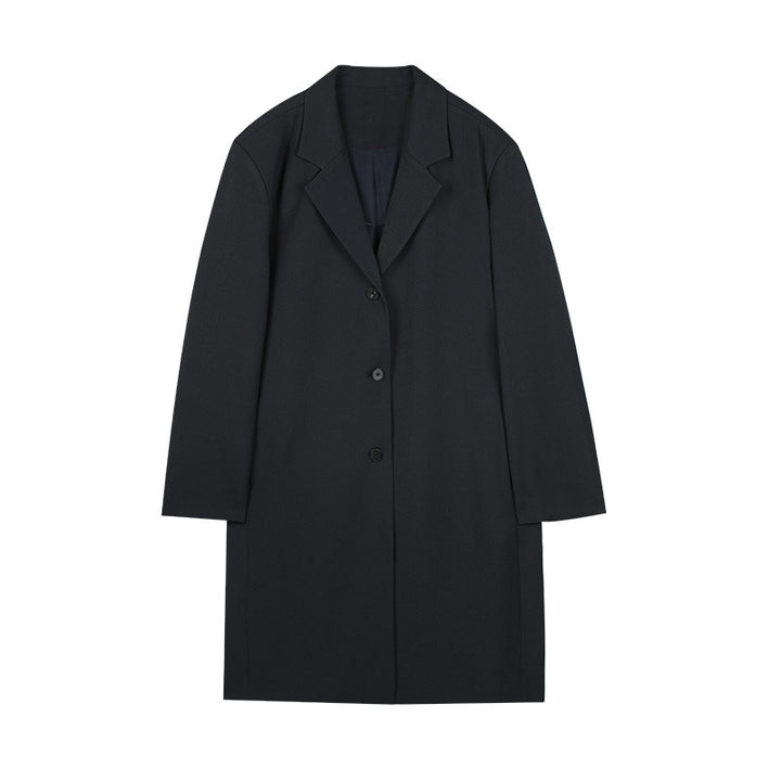 Dame elegant Langjakke med klassisk revers og moderne knapdetaljer Stilla