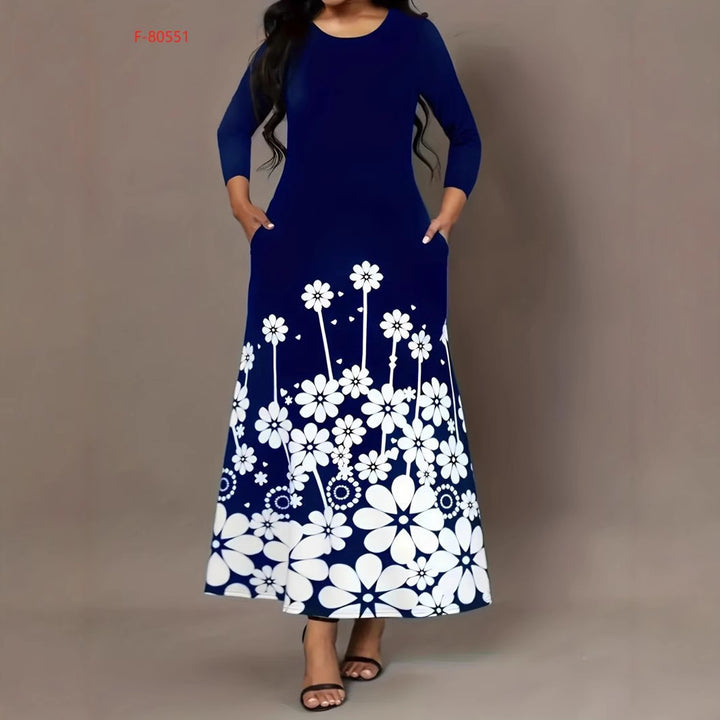 Dame maxikjole med blomstret design og praktiske lommer Stilla
