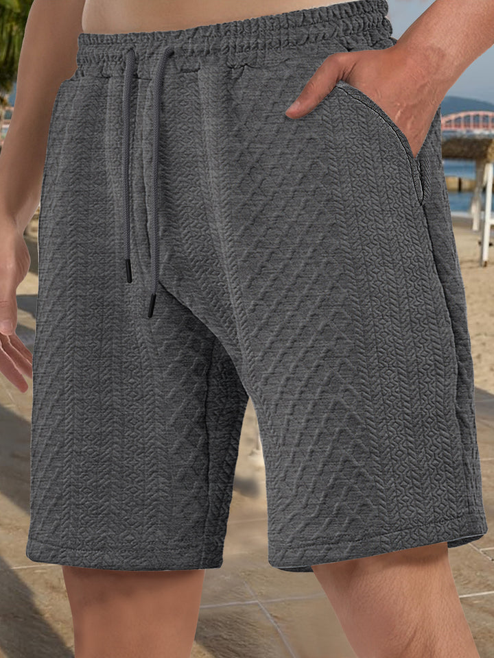 Herren nan struktureret strand-Bermuda lavet af waffeljersey med elastisk snoreliv og skrå sidelommer Skovae