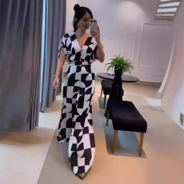 Dame Modet Jumpsuit med grafisk mønster og elegante ærmer Skovae