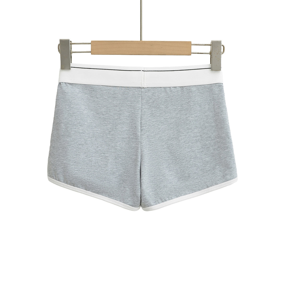Dame sporty korte shorts med elastisk talje og kontrasterende piping Stilla