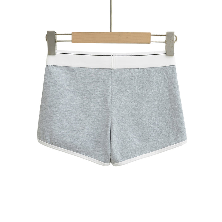Dame sporty korte shorts med elastisk talje og kontrasterende piping Stilla