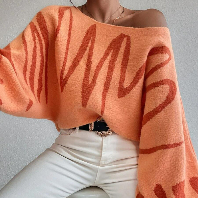 Kvinders oversized striktrøje med asymmetrisk design og afslappet halsudskæring Stilla