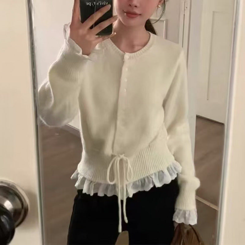 Kvinders cardigan med flæser og taljebånd Stilla