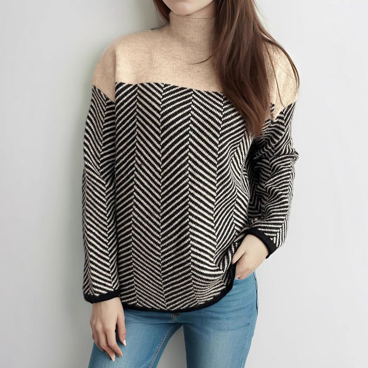Kvinders hyggelige rullekrave sweater med moderne herringbone mønster og elastiske manchetter Stilla